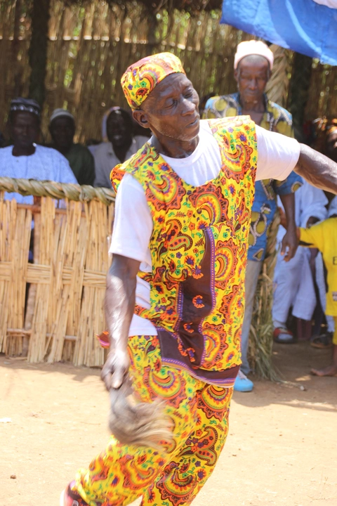 Man in front of crowd